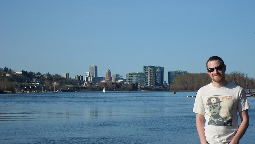 Photo of Author with the city of Portland in the background
